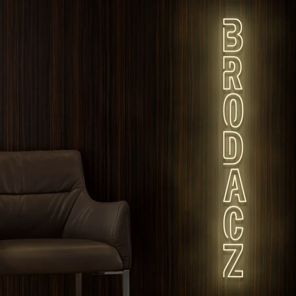 Beżowy neonowy napis Brodacz dekoracja ścienna