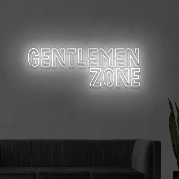Biały neon LED z napisem Gentlemen Zone na ścianie