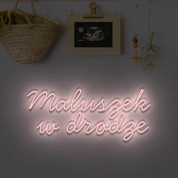 Jasnoróżowy neon LED z napisem Maluszek w drodze dekoracja