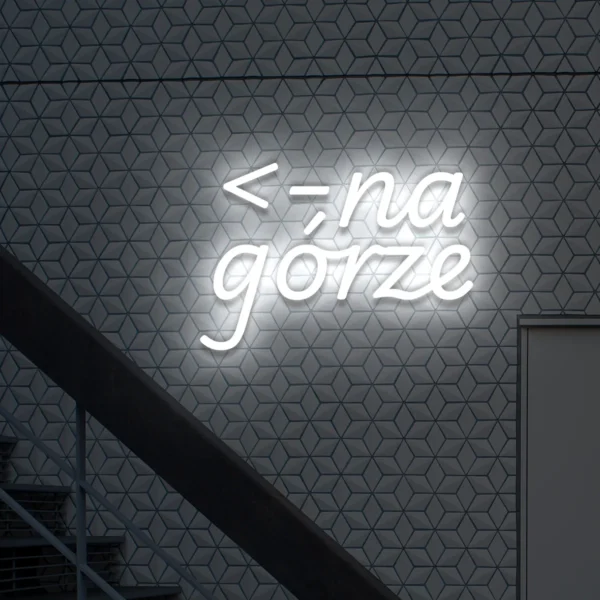Biały neon LED z napisem „na górze” i strzałką kierunkową