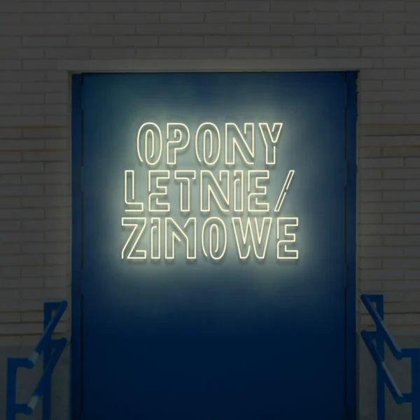 Beżowy neonowy napis Opony letnie/zimowe na drzwiach