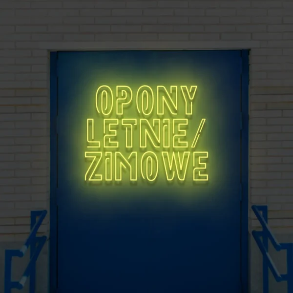 Żółty neonowy napis Opony letnie/zimowe na ścianie