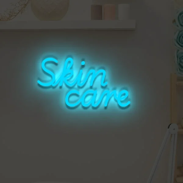 Niebieski neonowy napis Skin care świecąca dekoracja