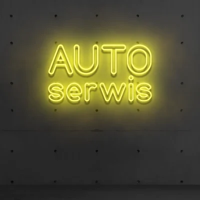 Żółty neonowy napis „AUTO serwis” reklama świetlna