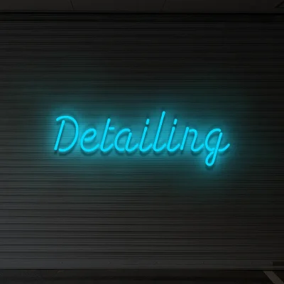 Niebieski neonowy napis Detailing podświetlana reklama