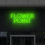 Zielony neon LED Flower Point – efektowny napis świetlny nad wejściem